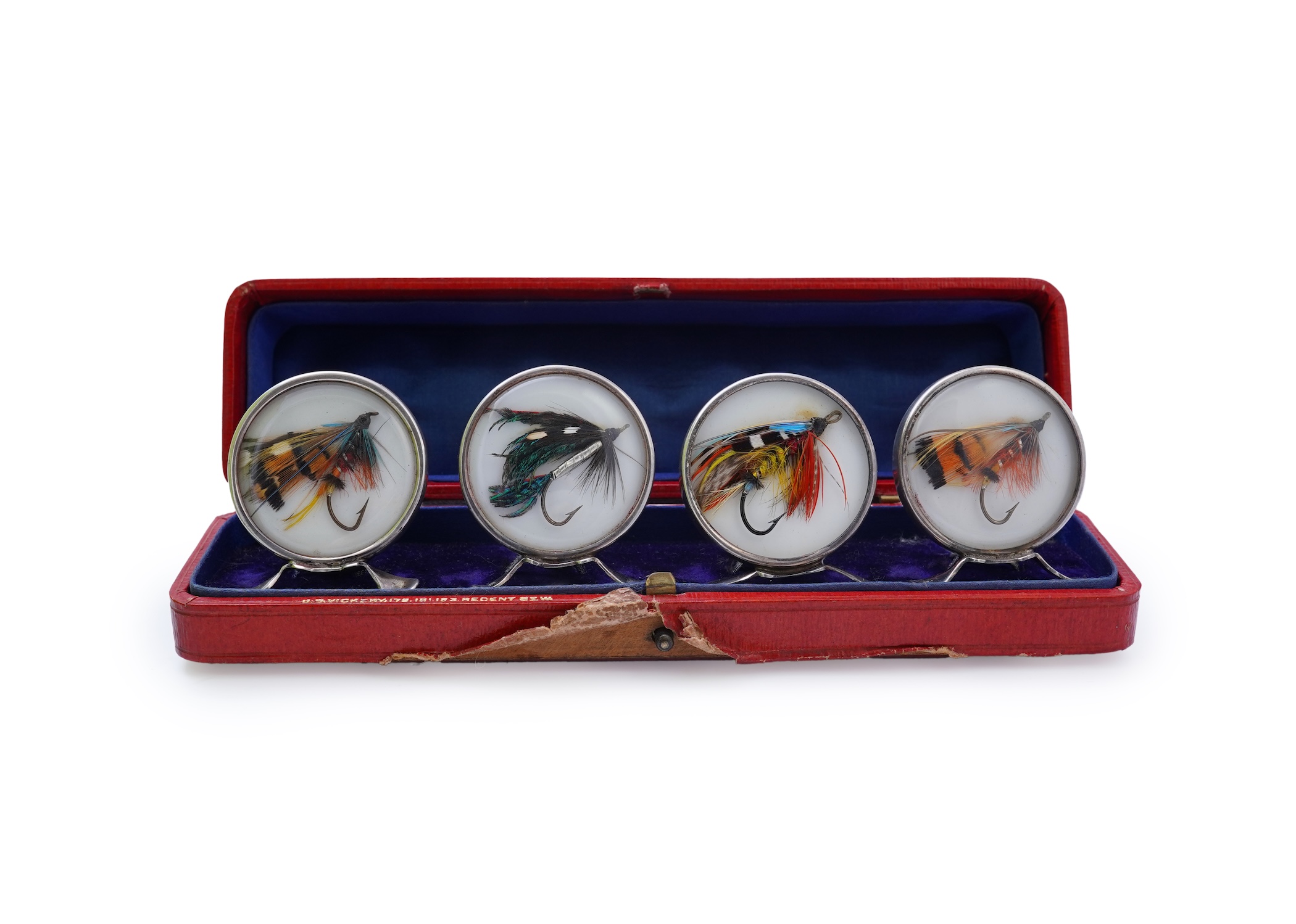 A set of four early 20th century silver mounted fishing related novelty menu holders, by Grey & Co, housed in a red leather case with gilt initials RV